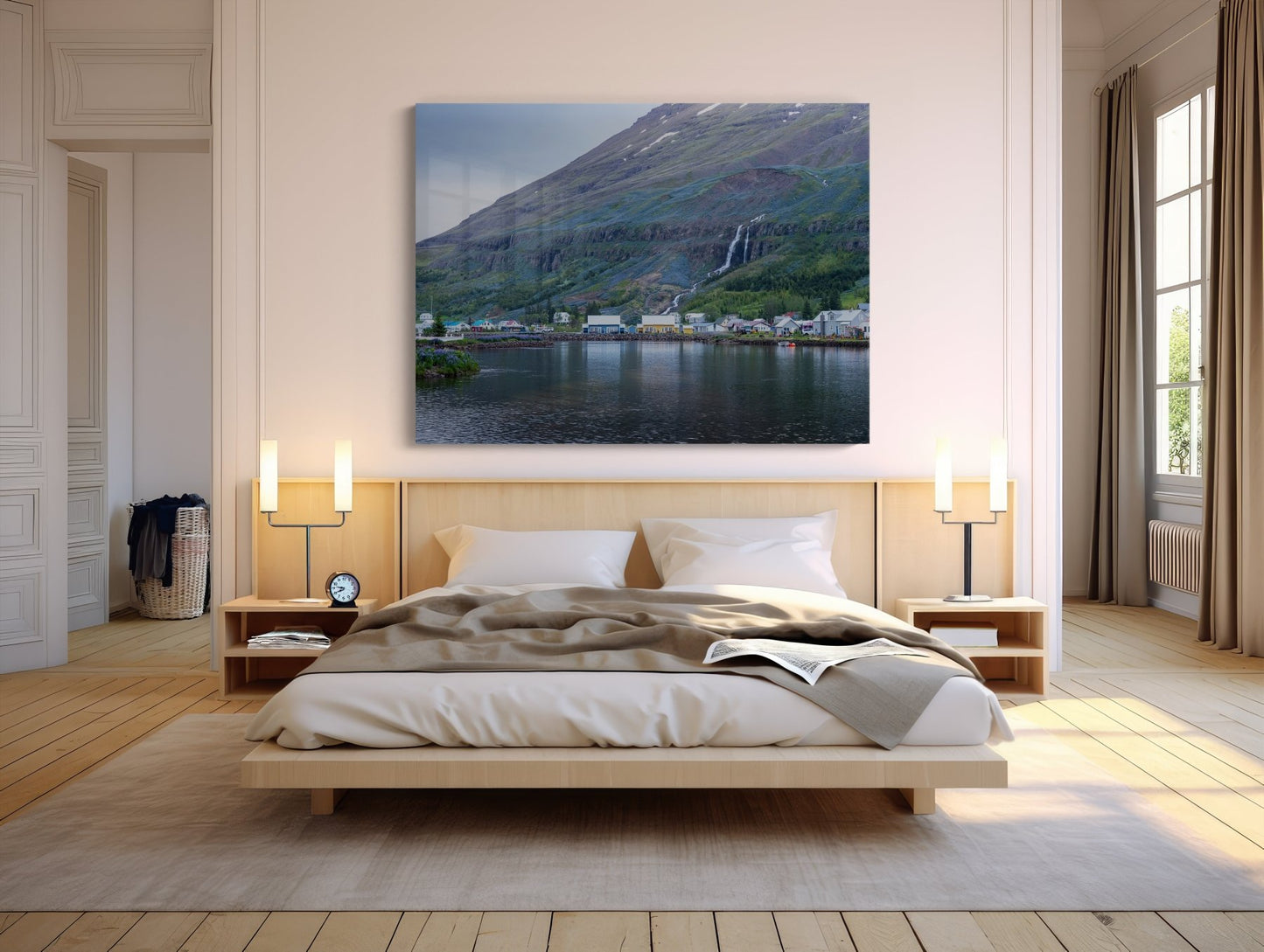 A modern, cozy bedroom with a large bed, two bedside tables and lamps, and The Perfect Pair - Iceland Photography Print | Seyðisfjörður Harbor Houses above the bed. Light wood furniture and neutral tones create a calm atmosphere.
